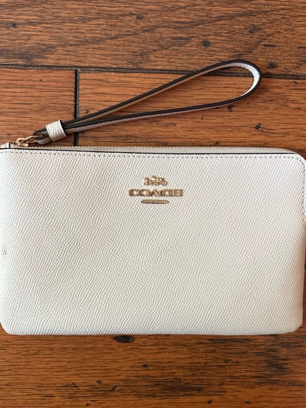 Coach Cream Pebbled Leather Wristlet with Gold Logo